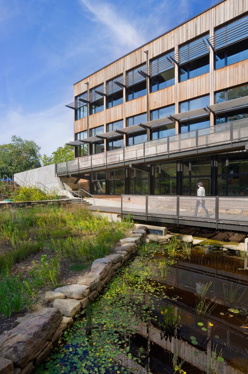 <p>A series of scuppers, open downspouts and gutters, flow forms and spillways direct rainwater to a biology pond and rain garden that supports the native habitat and serves as a programmatic component of the science curriculum. <br><small>&copy; Albert Vecerka/Esto</small></p>
