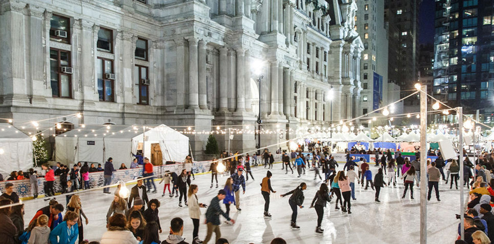 <p>During winter months, an ice rink operates over the fountain and draws visitors to the newly revitalized park. <br><small>Photo courtesy Center City District</small></p>