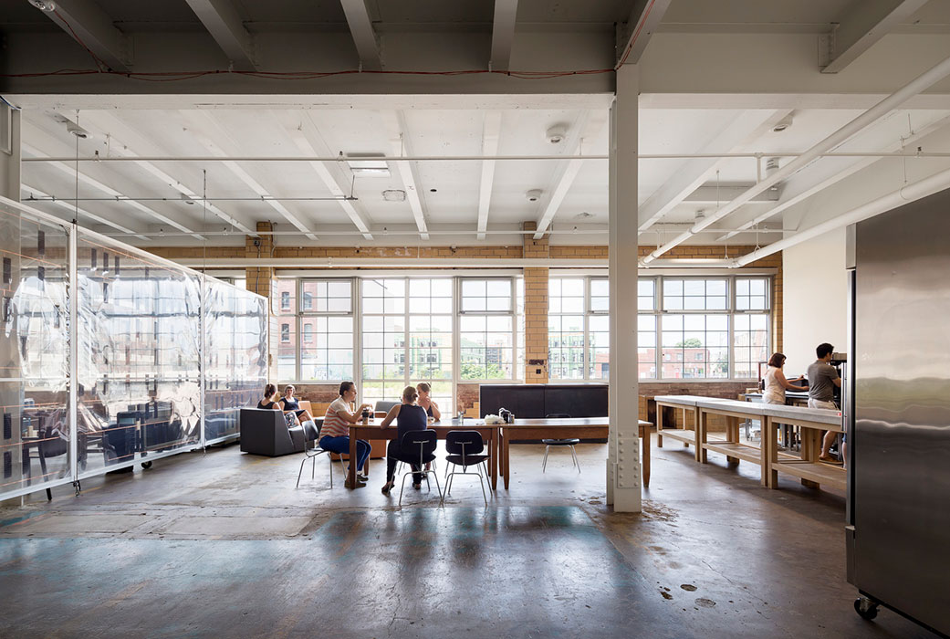 <p>Collaborative spaces are incorporated throughout the building, including in the first floor kitchen. &nbsp;<br /> <br><small>&copy; Michael Moran/OTTO</small></p>