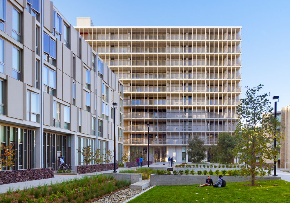<p>Three cast-in-place concrete structures—one 10-story, one 8-story, and one 5-story—are oriented for optimal environmental performance in San Diego's ideal climate. The plaza opens to the east, connecting the apartments to the center of campus and forming a community with the existing residences. <br><small>&copy; Tim Griffith</small></p>