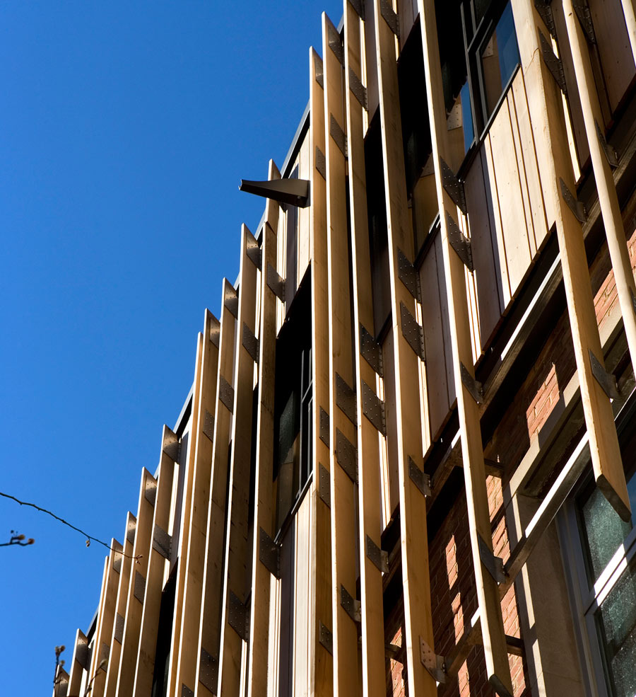 <p>Angled sunscreens on the building's exterior shade the interior and help to balance thermal performance with optimal lighting. <br><small>&copy; Peter Aaron/OTTO</small></p>