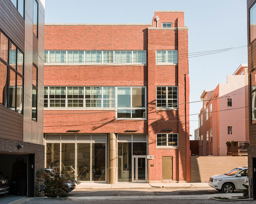 <p>Originally built in 1948, the former factory blends the International style popular in post-war industrial buildings with Philadelphia's traditional brick palette. <br><small>&copy; Chris Leaman</small></p>
