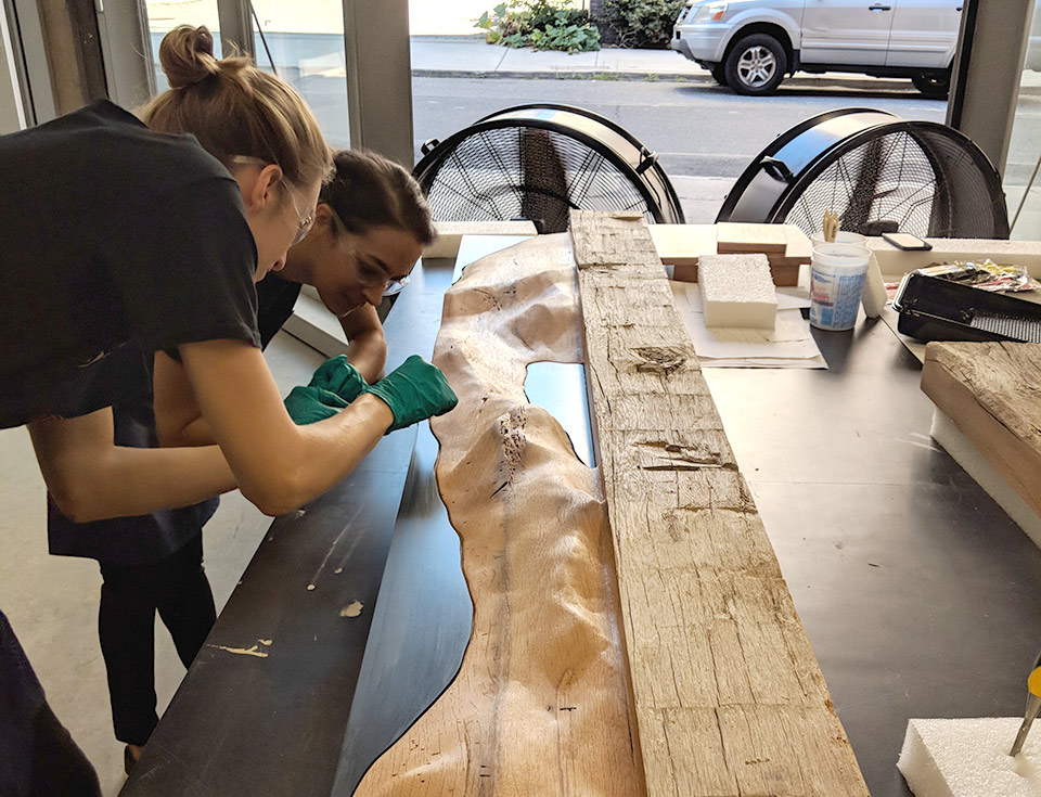 Our workshop and fabrication lab allows us to build complex mixed media fabrications such as the milled white oak and blackened steel decorative panels we made for a housing project at the University of Washington.
