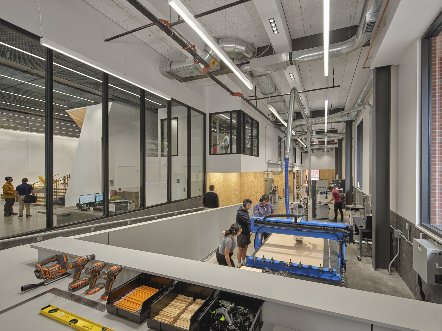 <p>The fabrication studios are the center of Penn State's culture of making and are visible from every direction. Strategic glass enclosures highlight the building's purpose and are an invitation for many different user groups and disciplines. <small>&copy; Halkin Mason Photography</small></p>