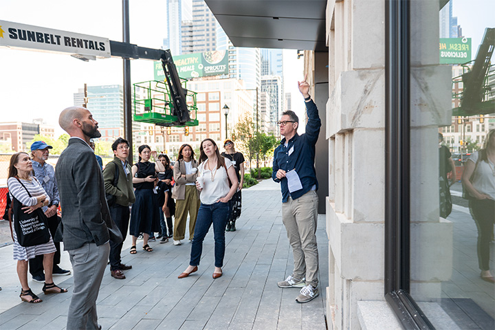 Principal Jon McCandlish with UPenn alumni group at 2300 Market